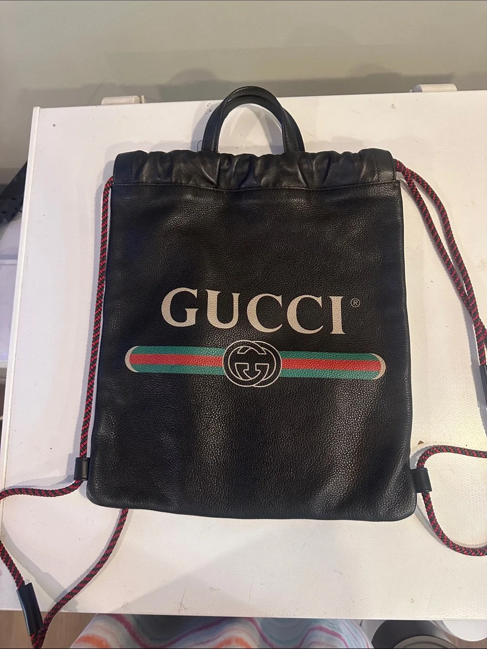 Gucci Black Leather Drawstring Backpack with Signature Web Stripe
